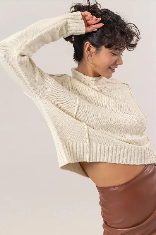 Hand - Knitted Women Sweater with Artisanal CharmHigh Neck Reverse Seam Sweater - Cream